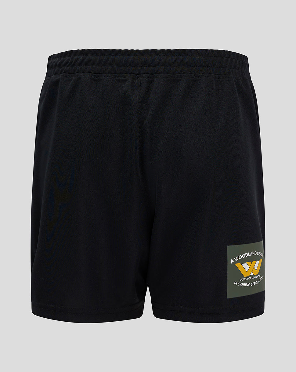 Mansfield Junior 24/25 Third Shorts in black with flat waistband and internal elastic, right thigh silicone crest and left thigh Castore branding.
