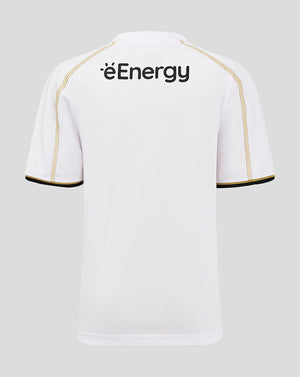 Back view of white MK Dons junior home shirt with éEnergy logo across the upper back.