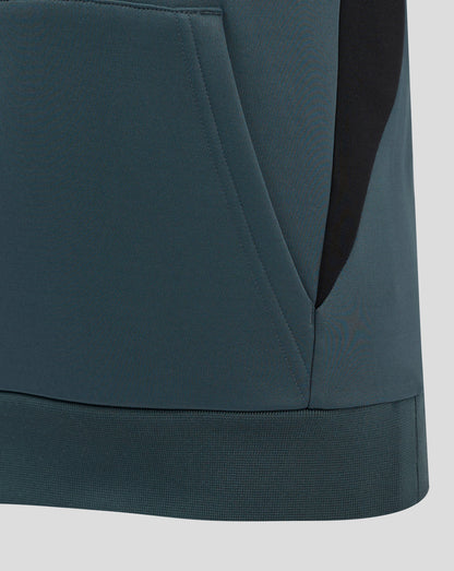 Close-up of teal Bath Rugby Junior training hoodie fabric detailing a front pocket and curved hem