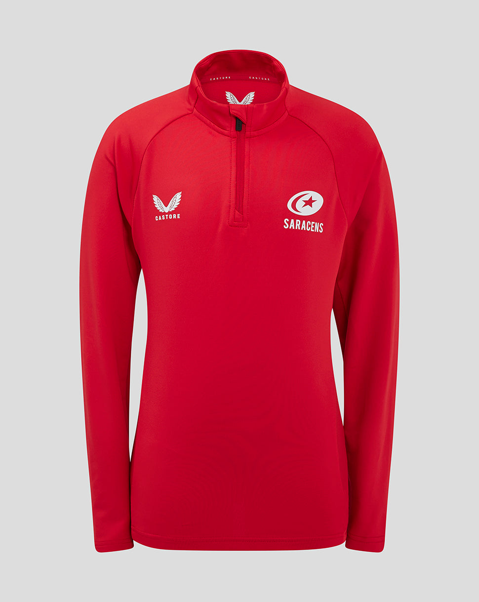 Front view of red Saracens junior training 1/4 zip with white Castore and Saracens logos.