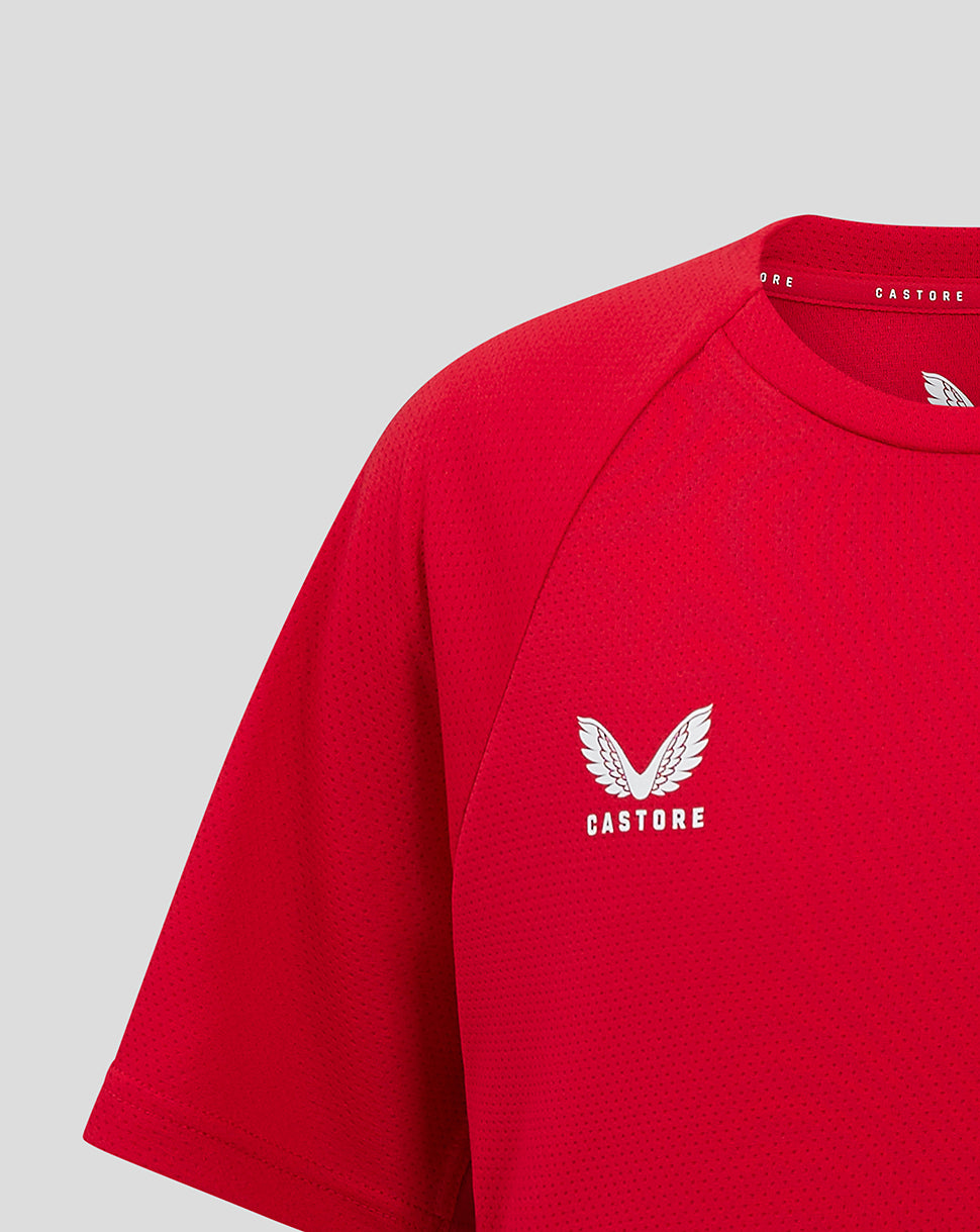 Red Saracens junior training tee close up showing white wing logo on chest