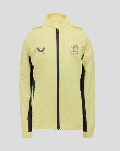 Everton 24/25 Junior Training Rain Jacket front view in pale yellow with black side panels and crest on the chest