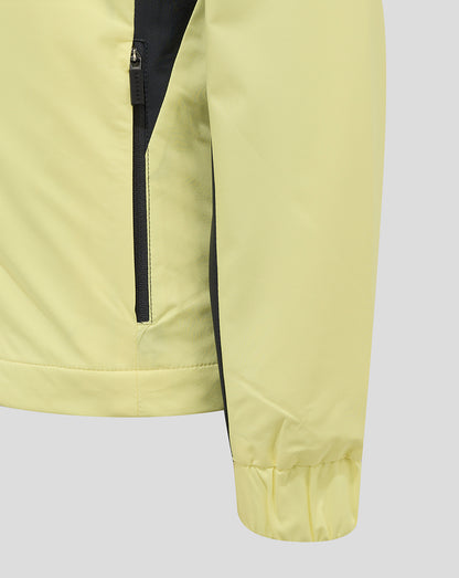 Close-up of pale yellow Everton 24/25 junior training rain jacket showing a vertical black zipper.