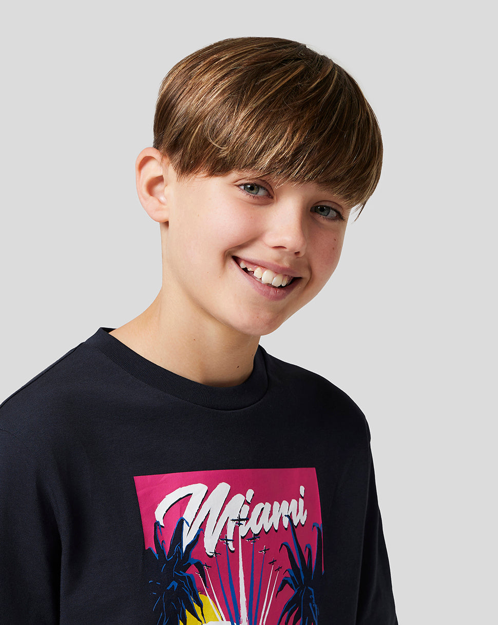 Boy in navy Miami graphic T shirt from Oracle Red Bull Racing shown from shoulders up