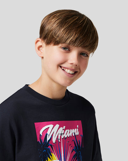 Boy in navy Miami graphic T shirt from Oracle Red Bull Racing shown from shoulders up