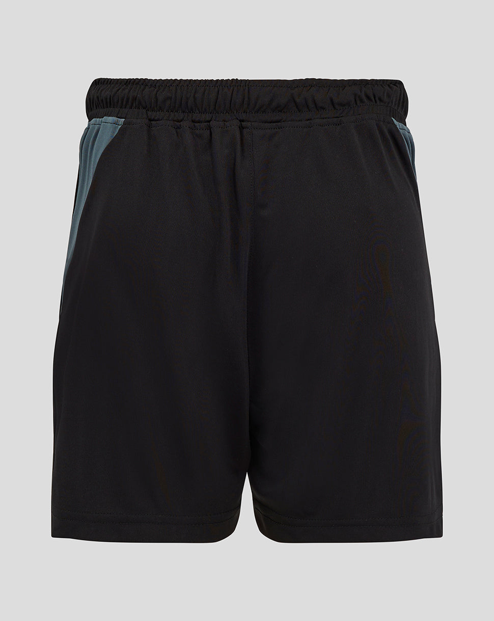 Front view of black junior training shorts with teal side panels and an elastic waistband