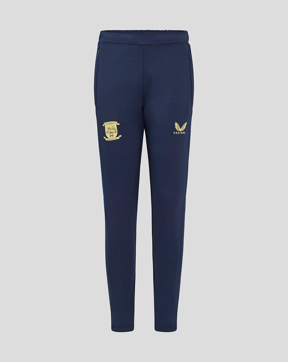 Back view of navy junior Preston North End training pants with pockets and crest on the left thigh and Castore logo on the right thigh