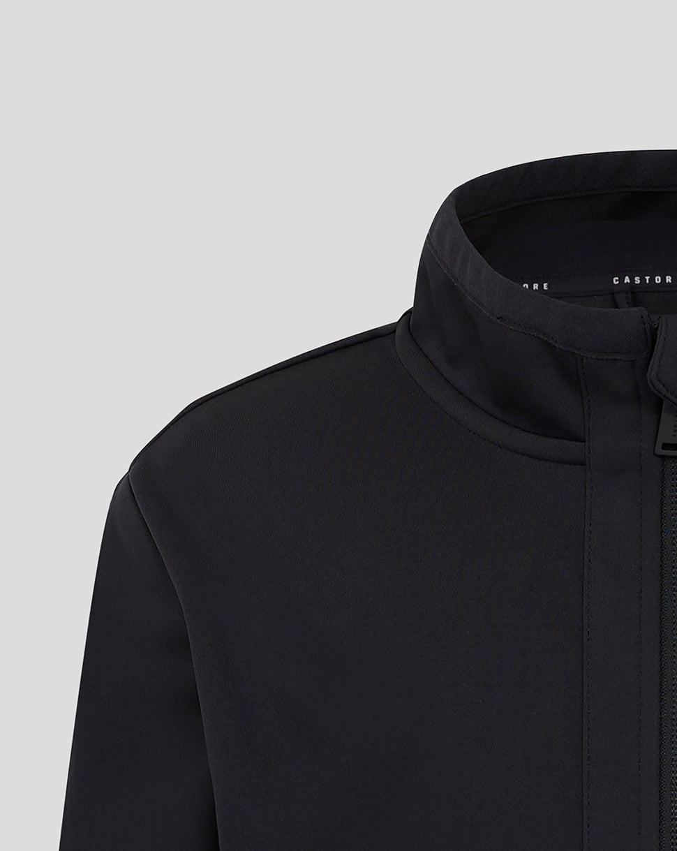 Close up of the jacket neck showing the high collar and front zip on Mk Dons Junior Travel Jacket