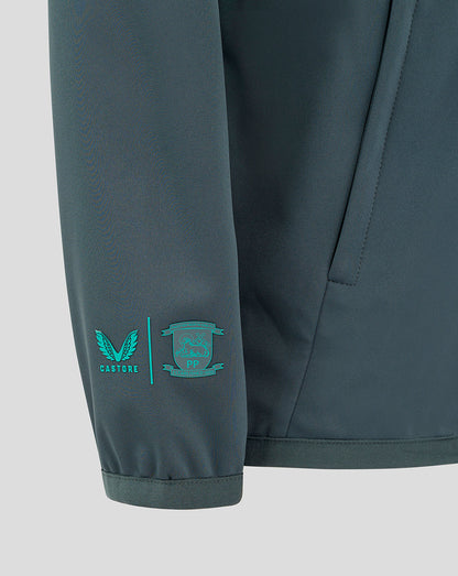 Teal Preston North End junior travel jacket sleeve with Castore logo and PNE crest near the cuff