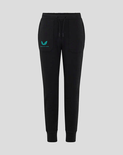 Front view of black Mansfield junior travel pants with teal logo on left thigh.
