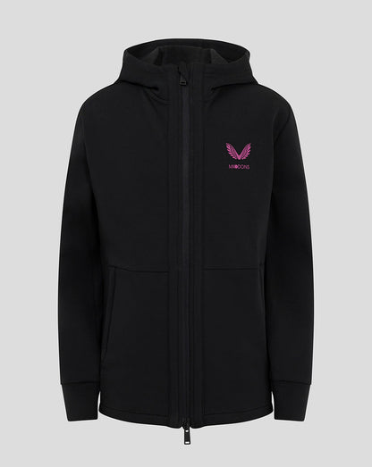 Front view of black Mk Dons junior hooded travel jacket with a pink crest logo on the chest and full zip