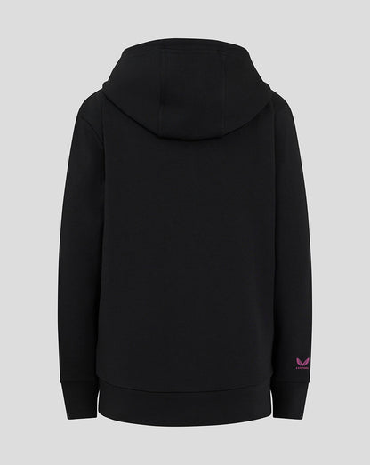 Back view of black Mk Dons junior hooded travel jacket with a pink logo at the sleeve cuff