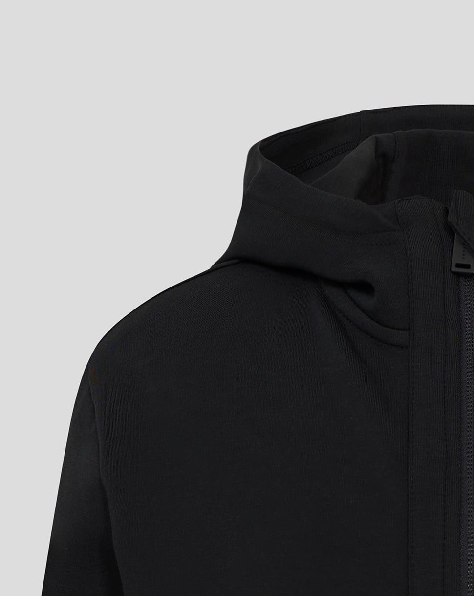Close-up of the hood and zipper detail on the black Mk Dons junior hooded travel jacket