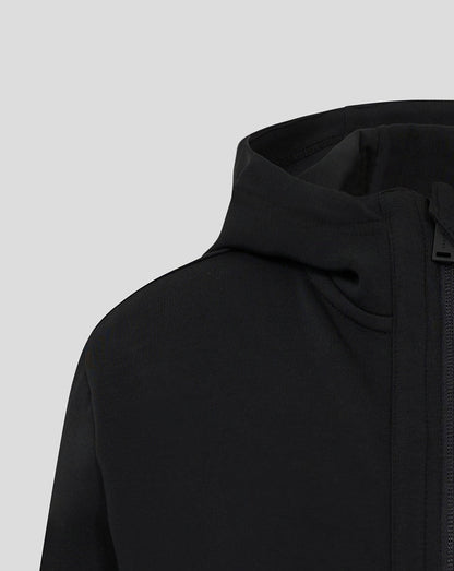 Close-up of the hood and zipper detail on the black Mk Dons junior hooded travel jacket