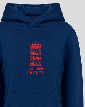 Close up of navy junior hoodie showing the red England Cricket crest on the chest