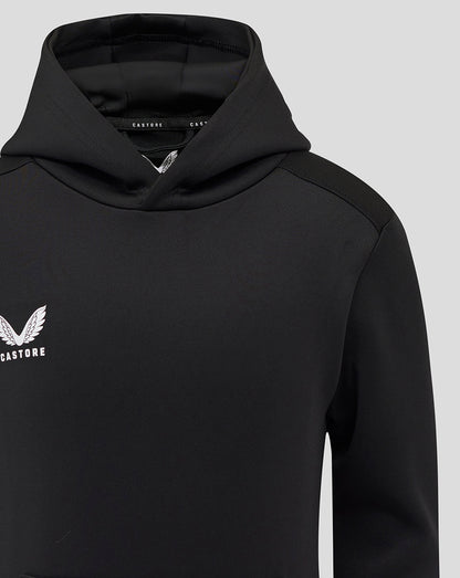 Close-up of black hoodie upper chest showing white wing logo and Castore branding.