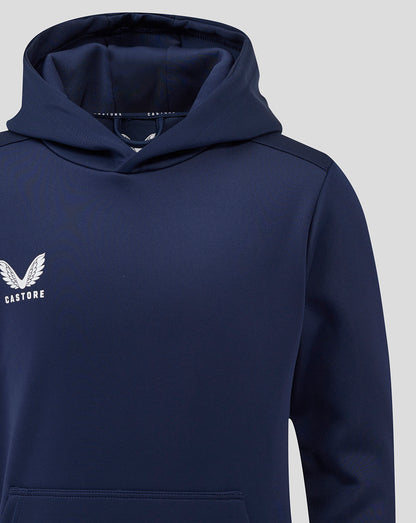 Close up of navy peacoat hoodie showing Castore logo on left chest and hood.