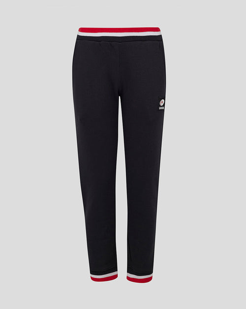 Back view of Saracens Junior Classic Joggers in black with red white striped waistband and a small logo patch on the hip.