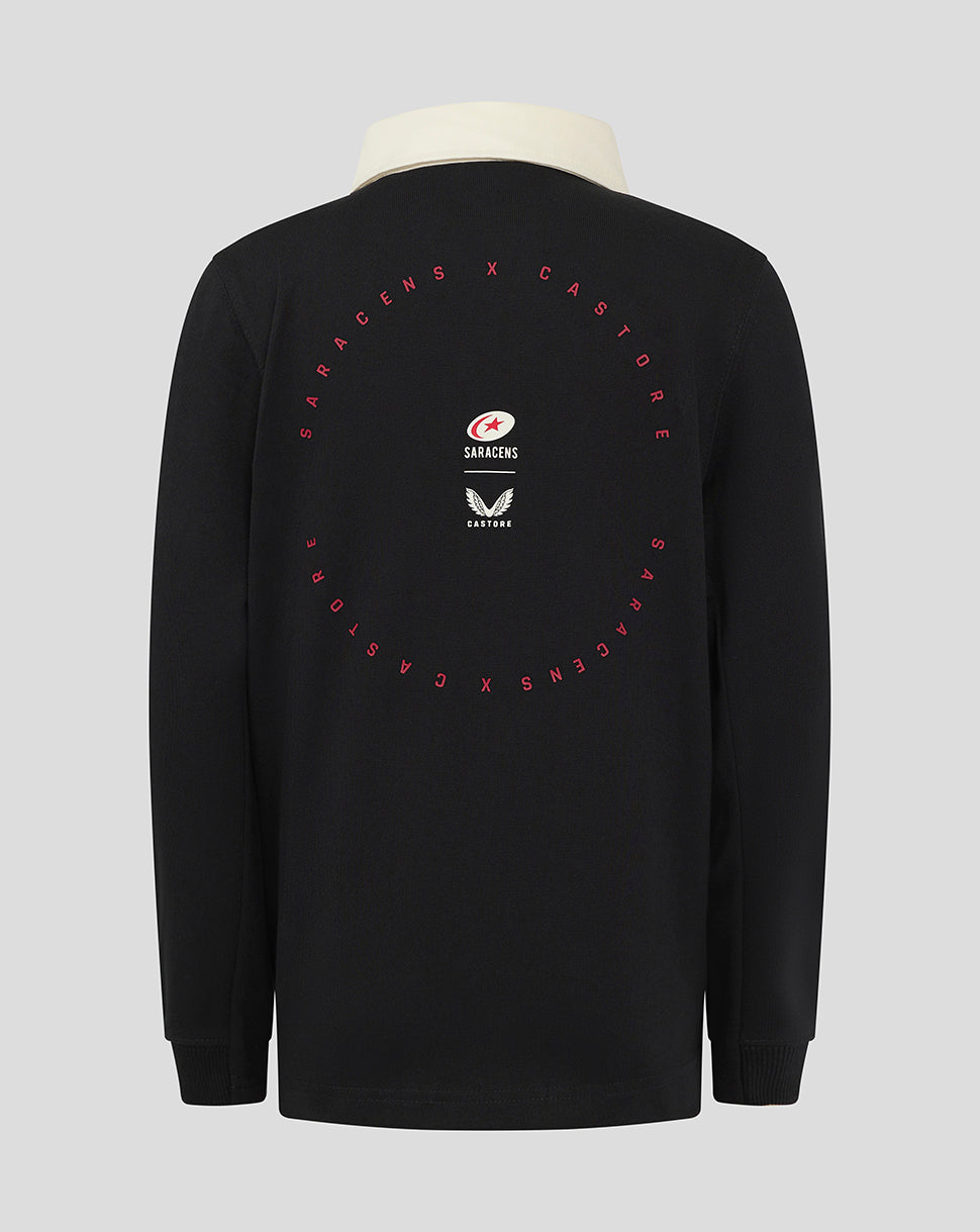Back view of black Saracens junior rugby jersey with cream collar and a red circular graphic on the back