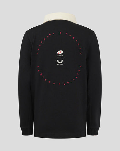 Back view of black Saracens junior rugby jersey with cream collar and a red circular graphic on the back