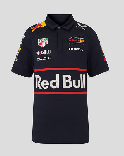 Front view of navy Oracle Red Bull Racing junior polo shirt with large Red Bull logo and sponsor decals