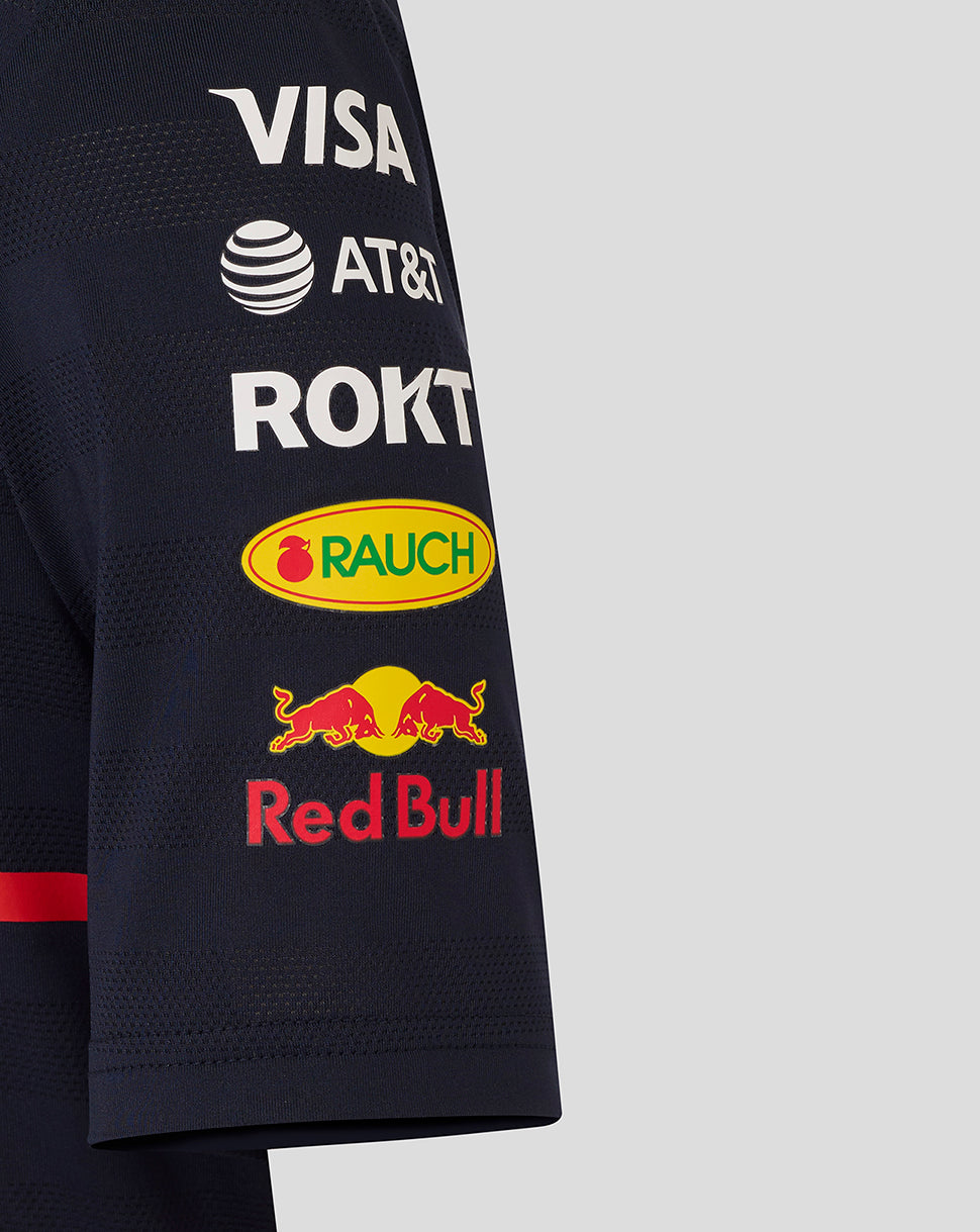 Close-up of the navy sleeve with sponsor logos including Visa AT&T Rauch and Red Bull branding