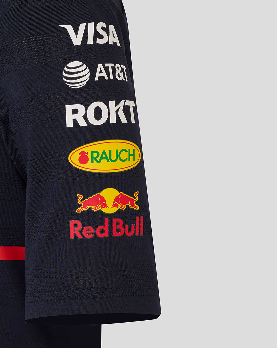 Close up of the navy sleeve showing vertical sponsor logos including Visa AT&T ROKT and RAUCH.