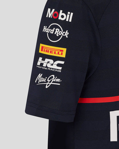 Close-up of a navy Oracle Red Bull Racing junior T shirt sleeve with Mobil Hard Rock Pirelli Honda Racing and Maui Jim logos