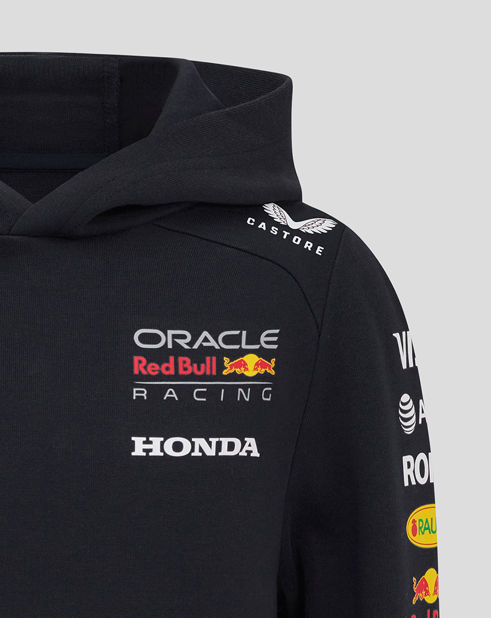 Shoulder area of black hoodie with Castore crest and Oracle Red Bull Racing branding on the sleeve and chest.
