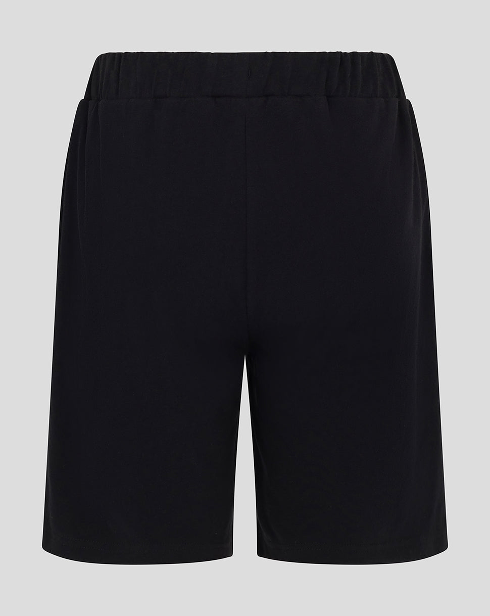 Back view of Harlequins Youth black shorts with elastic waistband