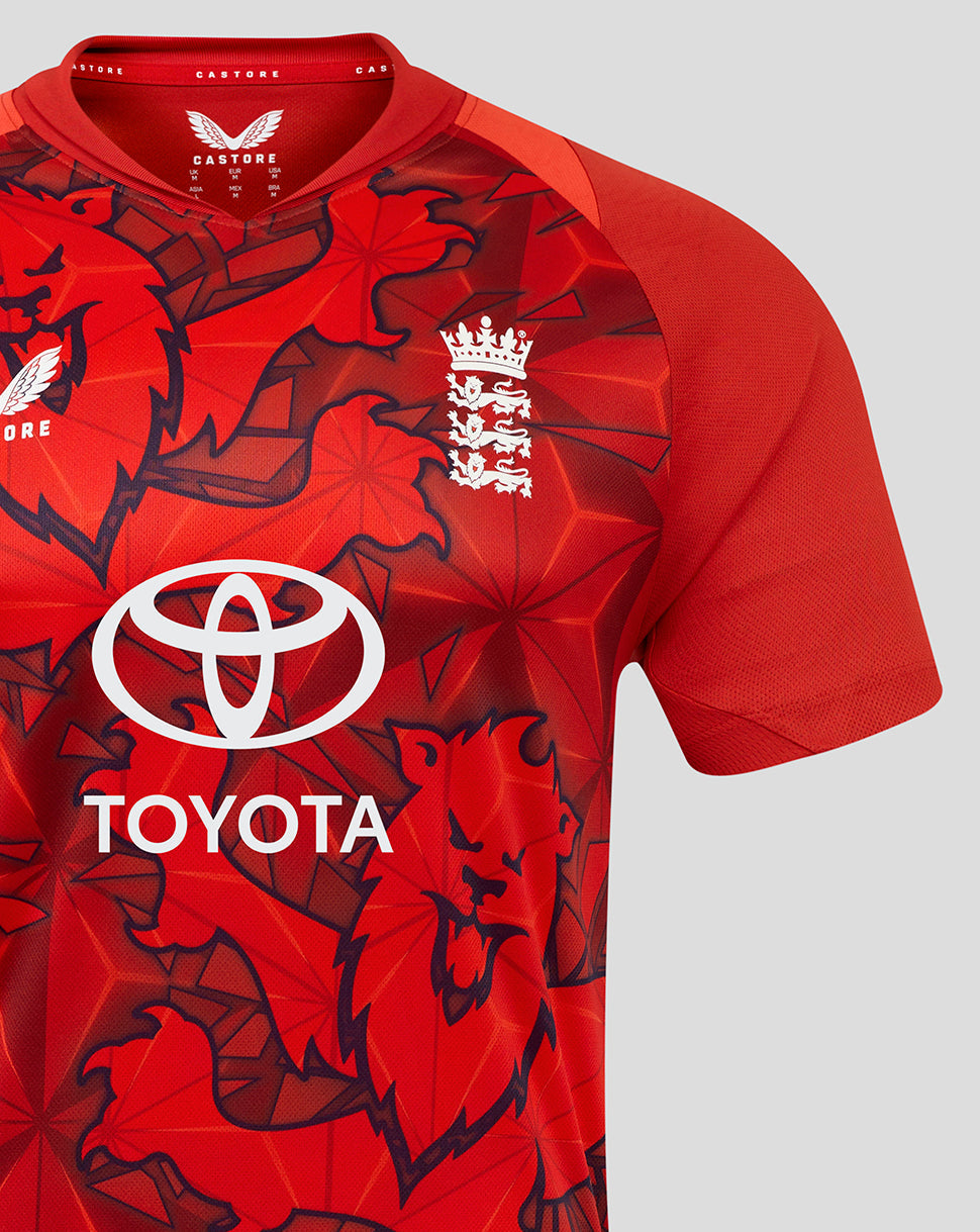 Front close-up of red England 25/26 T20 shirt with bold leaf pattern England crest and Toyota logo