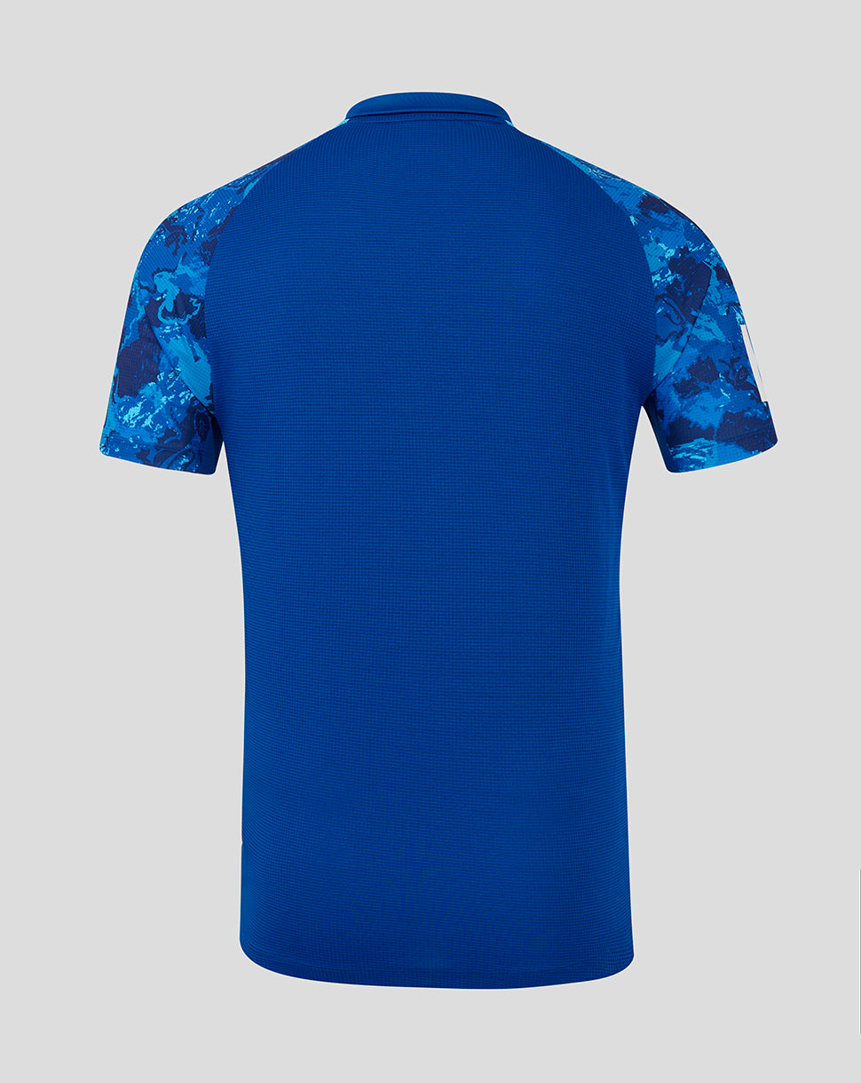 Back view of blue England ODI Pro Short Sleeve Shirt with camo sleeves