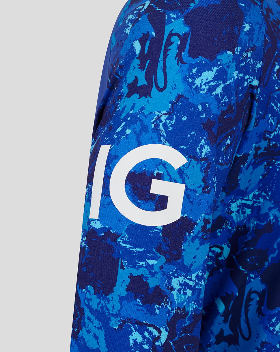 Blue camouflage knit sleeve from England cricket ODI sweater with bold white sponsor graphic.