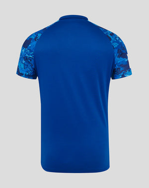 Back view of the England ODI shirt showing solid blue body with patterned shoulders.
