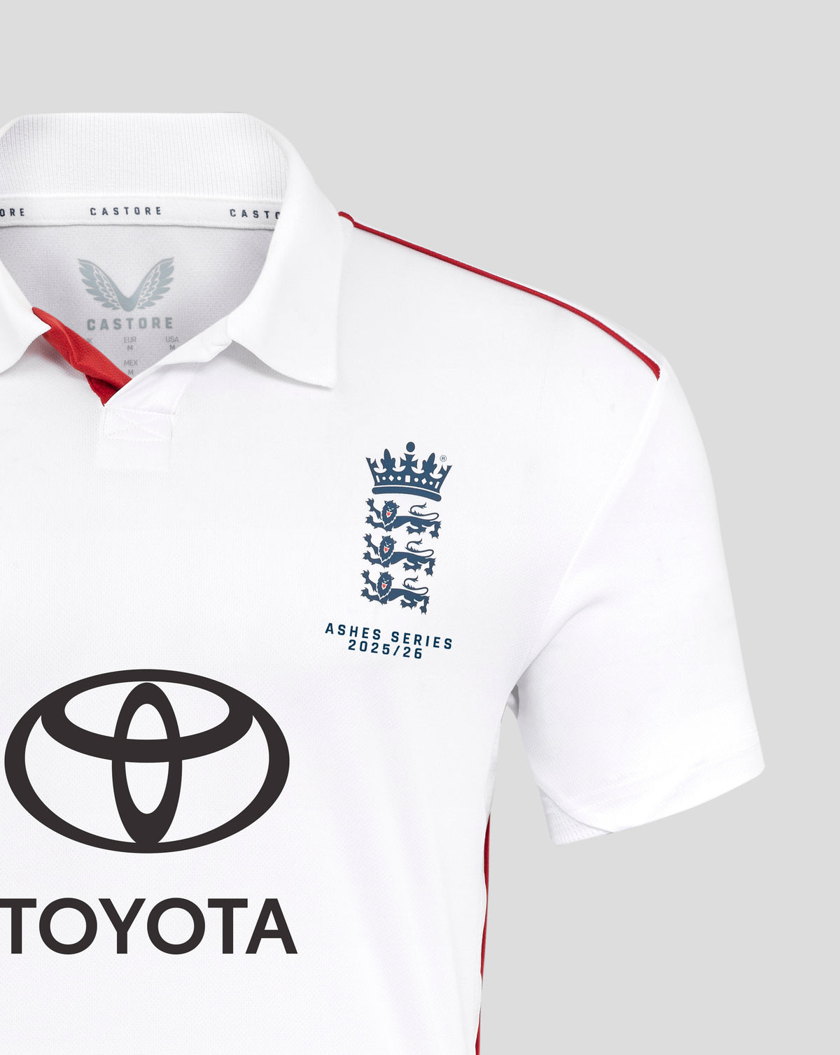 White England Ashes replica shirt collar with red piping and Castore branding on neck tape and partial crest.