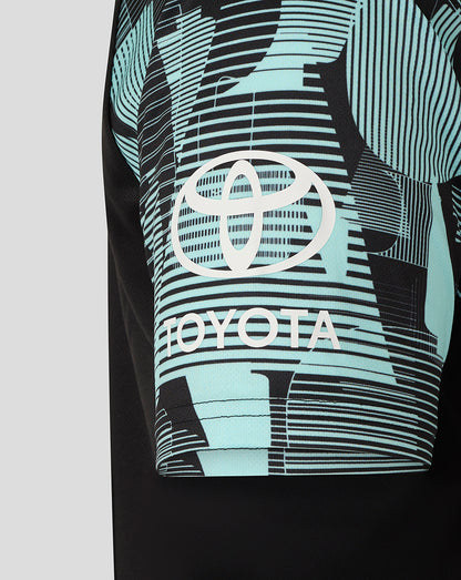 Junior Ashes training tee sleeve featuring Toyota logo on teal geometric print