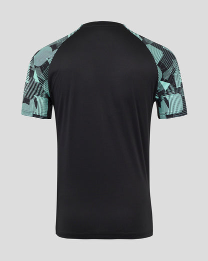 Back view of England Ashes Pro Training short sleeve tee showing black body and teal geometric patterned sleeves