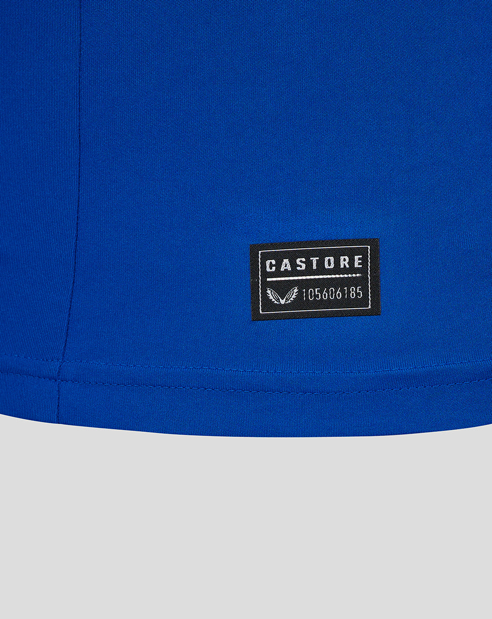Blue Rangers Ibrox 125 Heritage shirt hem with Castore patch sewn near the bottom.