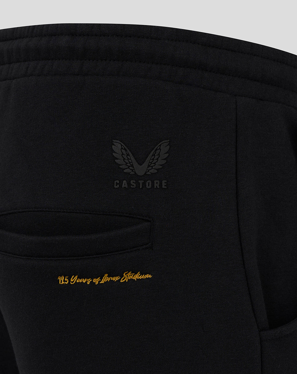 Close up of black Rangers FC Hype Joggers back pocket with gold 125 Years of Ibrox Stadium embroidery and Castore logo