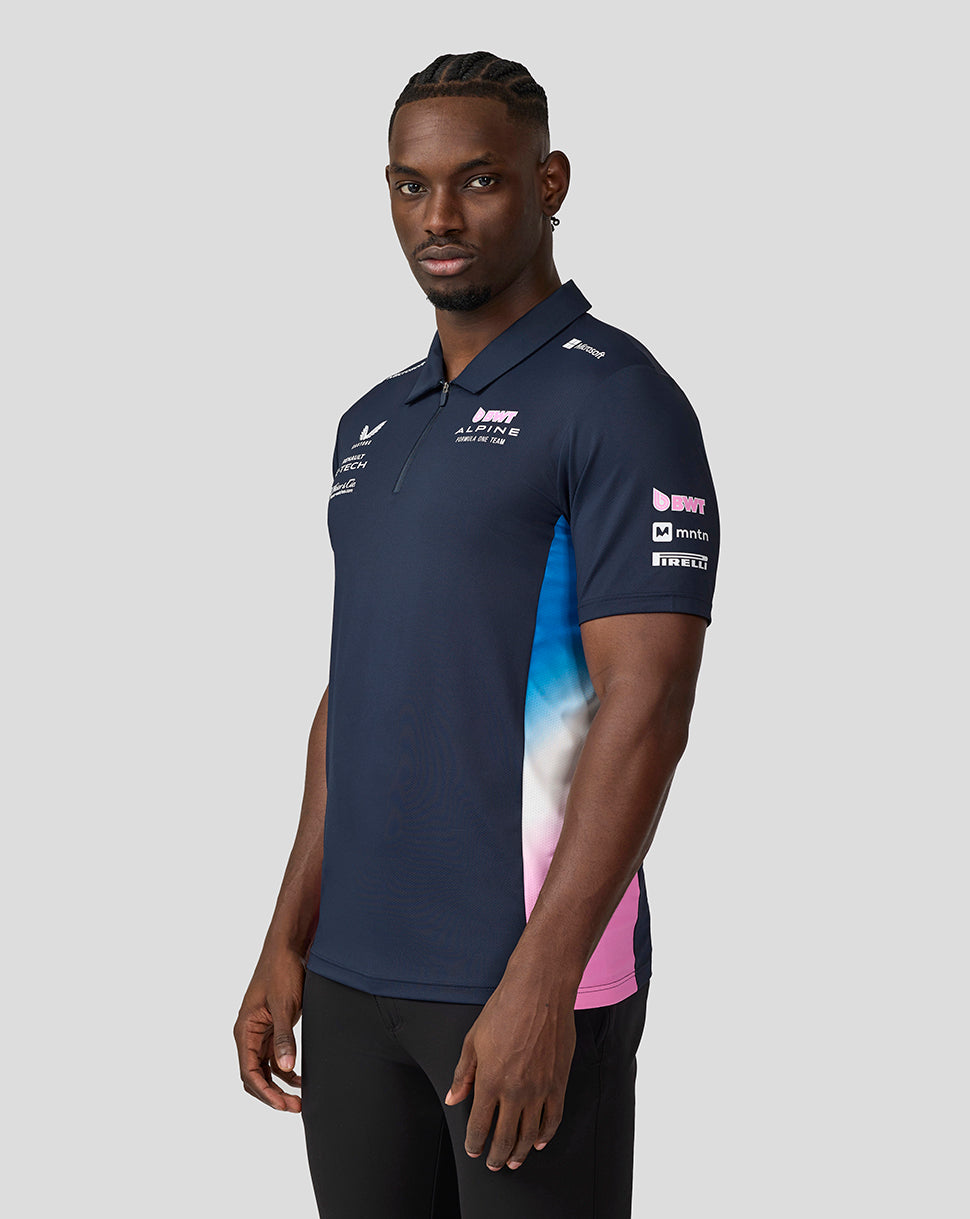 Front view of navy BWT Alpine Formula One Team polo shirt with team logos on the chest and color side panels.