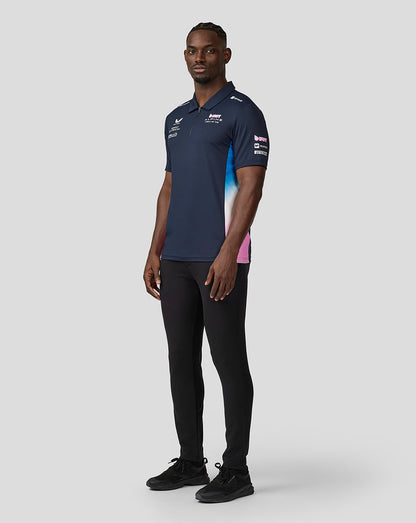 Three quarter view of navy BWT Alpine polo showing chest branding and gradient side panel.
