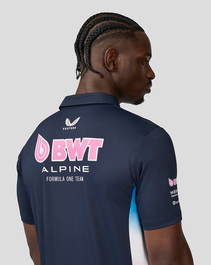 Back view of navy BWT Alpine Formula One Team polo showing large pink BWT logo and Alpine branding
