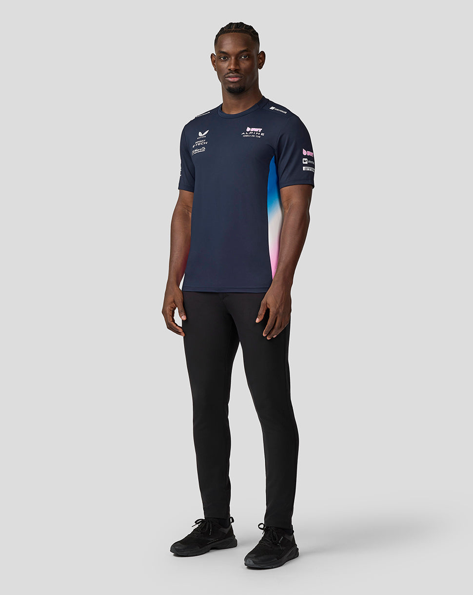 Front view of male model in navy BWT Alpine Set Up T Shirt with Alpine branding on chest and side panels.