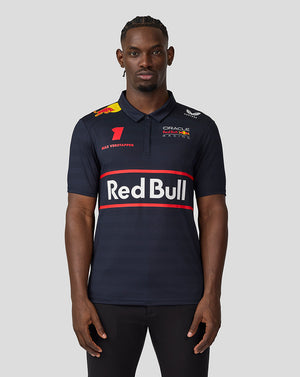 Front view of a male model wearing Night Sky navy Oracle Red Bull Racing polo with large Red Bull logo and Verstappen graphics
