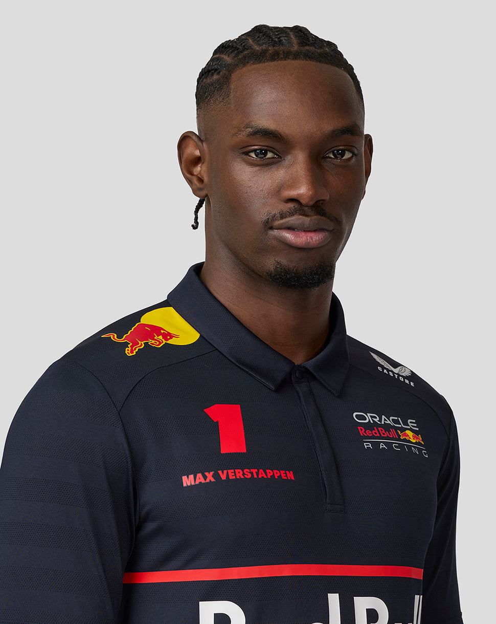 Male model wearing navy Oracle Red Bull Racing polo with Max Verstappen artwork and team graphics