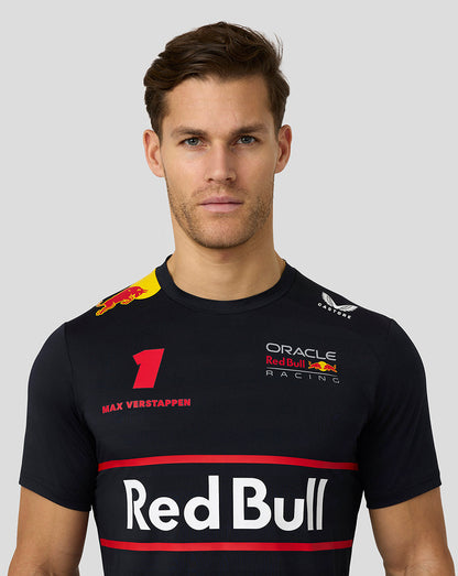 Close up of a model wearing a black Night Sky Red Bull Racing T-shirt with Verstappen number 1 on the chest.