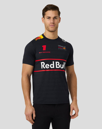 Portrait of a male model wearing a navy Oracle Red Bull Racing Mens Teamline Set Up T Shirt with Max Verstappen artwork on the right chest.