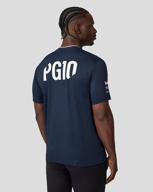 Front view of a man wearing a navy BWT Alpine Formula One Team Pierre Gasly driver jersey with bold blue geometric graphics and team logos.