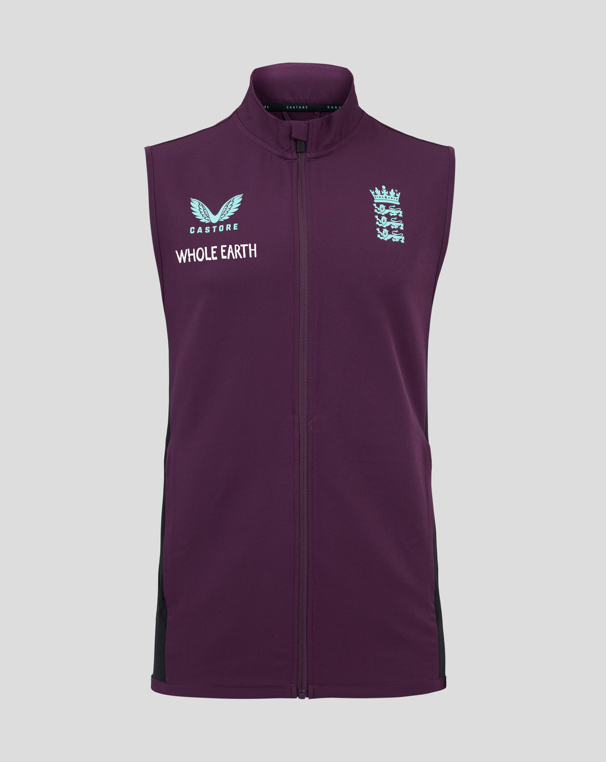 Front view of plum training gilet with light blue Castore wings logo and WHOLE EARTH text on left and England crest on right