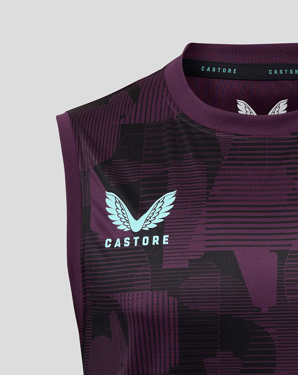 Close-up of neck and shoulder on purple England vest showing Castore branding and light blue crest